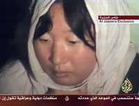 Imagen tomada de un video presentado por la cadena Al Jazeera, en la que se ve a una de las siete mujeres sudcoreanas secuestradas por la milicia talibán en Afganistán