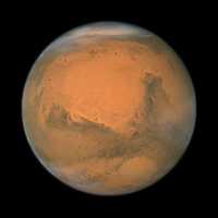 El pasado 18 de diciembre Marte se colocó en oposición con la Tierra. Arriba, acercamiento del planeta rojo tomado por el telescopio Hubble de la NASA