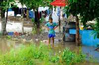 Lluvias generadas por los remanentes de la onda tropical número 9 y por la número 10 causaron daños en varias comunidades de Veracruz. La imagen, en el municipio de Actopan