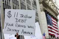 Manifestación en Nueva York, ayer, en las afueras de la bolsa de valores, en reclamo de que el rescate financiero proteja a los trabajadores