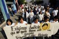 Pobladores de Ocotlán, Jalisco, durante la marcha en repudio al asesinato del joven Fernando López Alejandre, ocurrido el pasado primero de enero